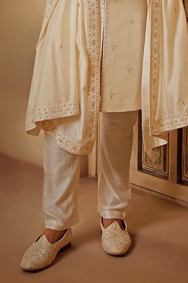 Pearl White Raw Silk Mirror Embroidered Groom Sherwani Set by Vanshik at Pernia's Pop Up Shop