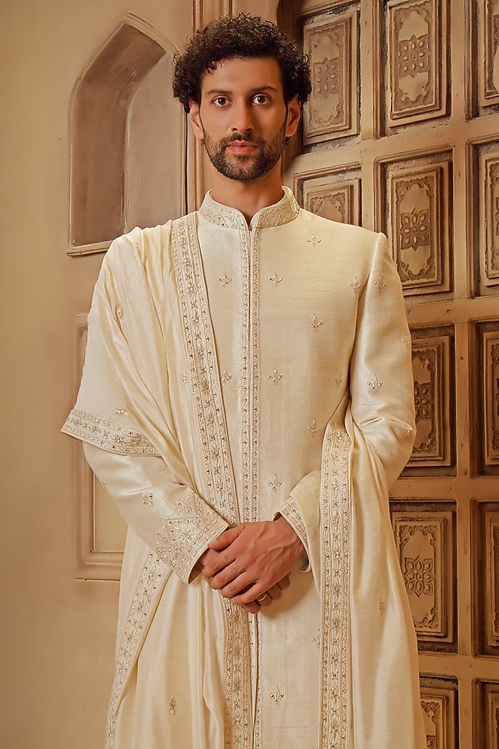 Pearl White Raw Silk Mirror Embroidered Groom Sherwani Set by Vanshik at Pernia's Pop Up Shop