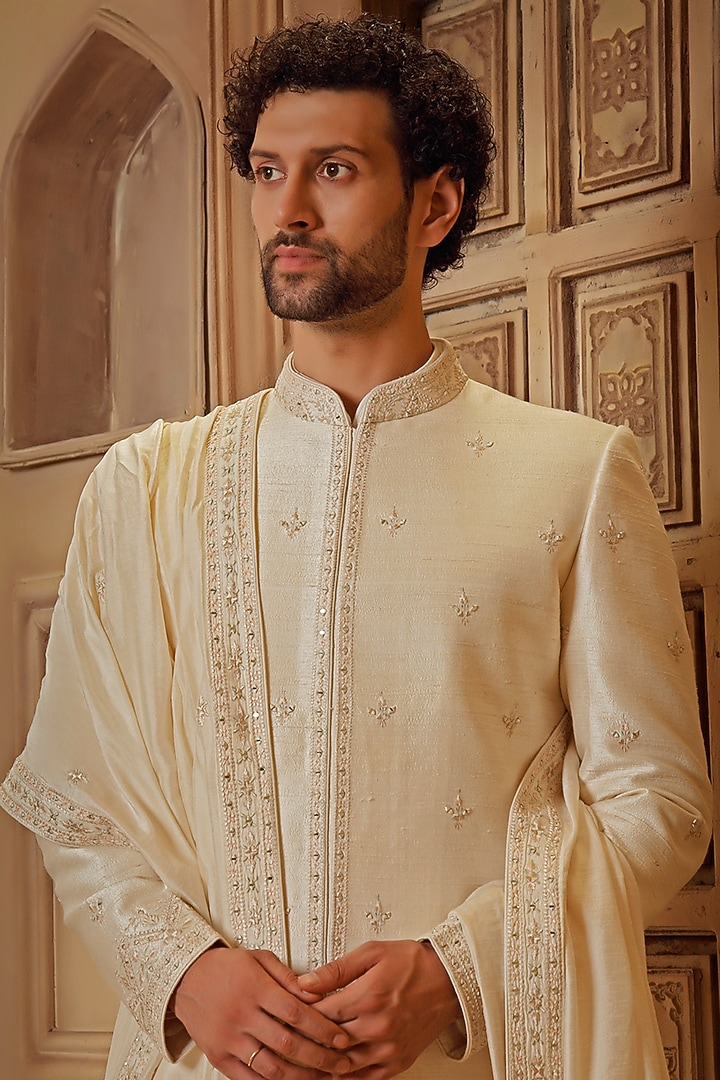 Pearl White Raw Silk Mirror Embroidered Groom Sherwani Set by Vanshik at Pernia's Pop Up Shop