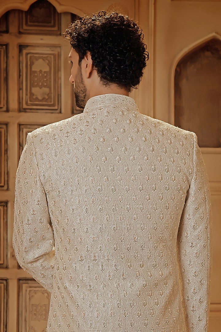 Pearl White Raw Silk Resham Embroidered Groom Sherwani Set by Vanshik at Pernia's Pop Up Shop