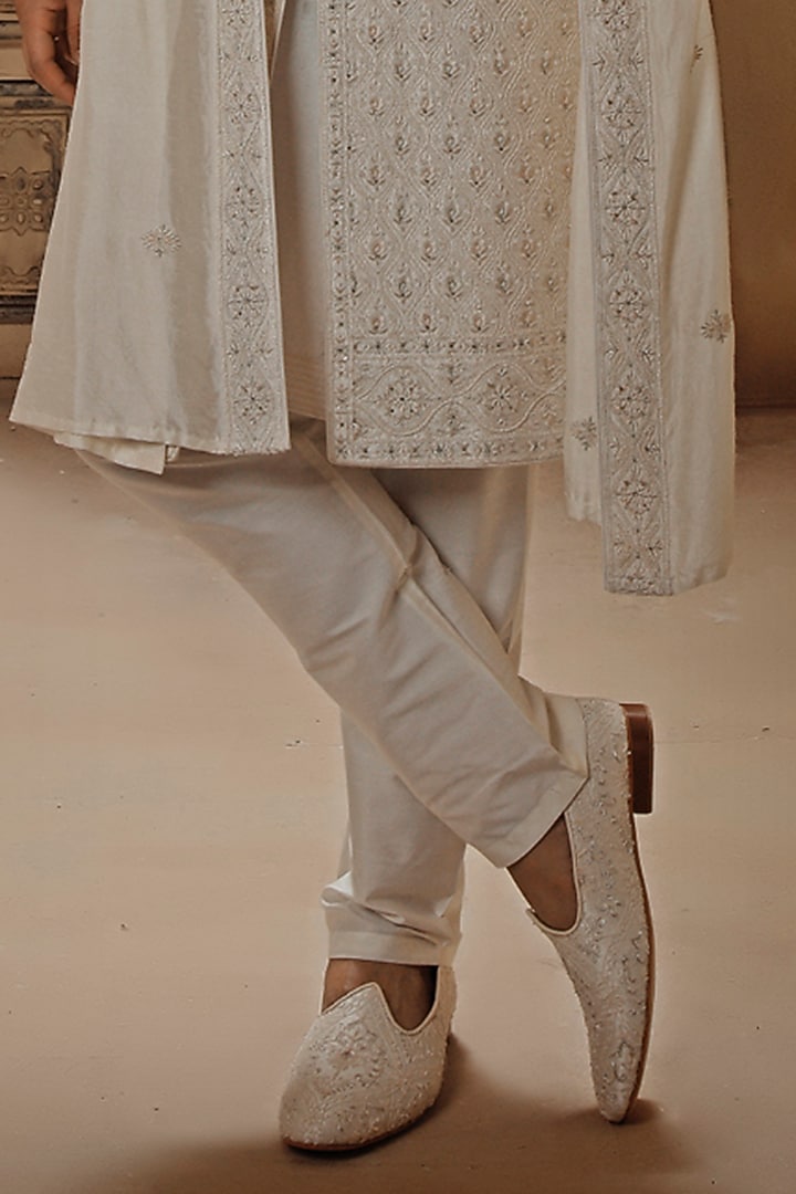 Pearl White Raw Silk Resham Embroidered Groom Sherwani Set by Vanshik at Pernia's Pop Up Shop