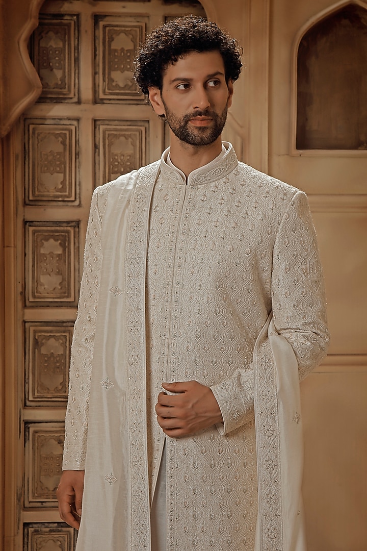 Pearl White Raw Silk Resham Embroidered Groom Sherwani Set by Vanshik at Pernia's Pop Up Shop