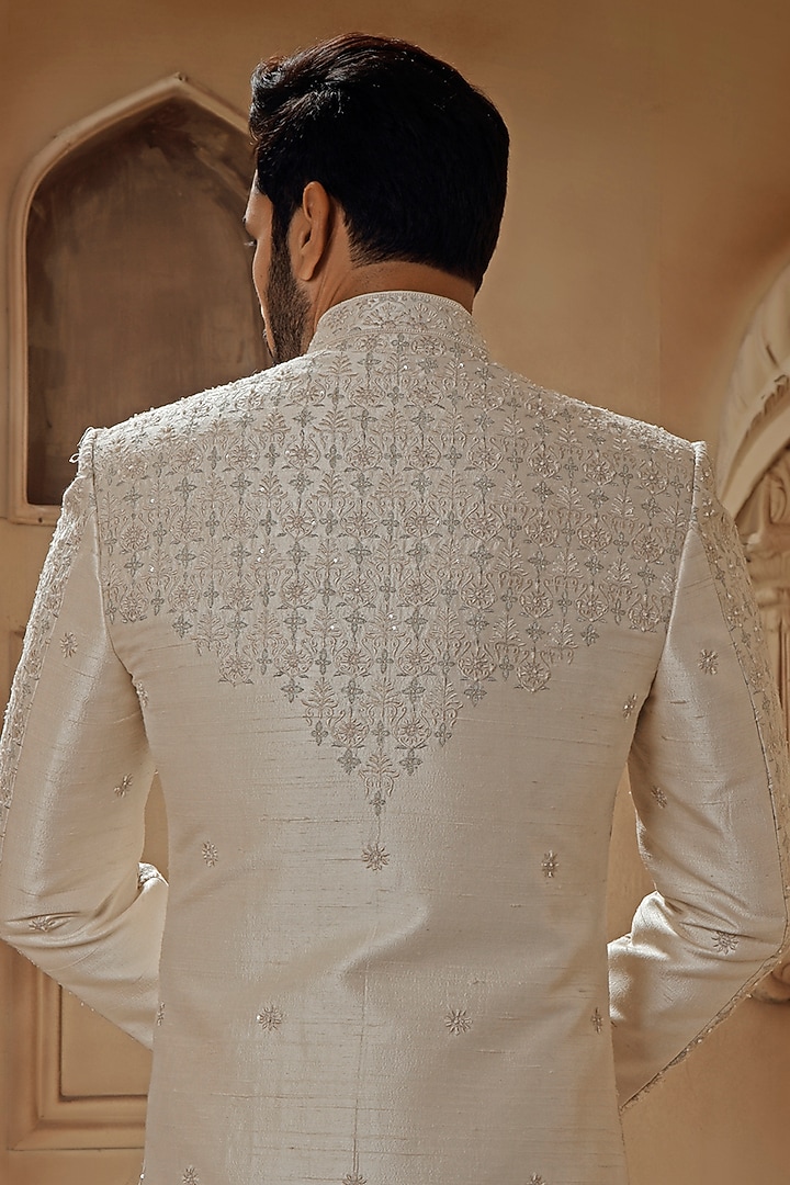 Pearl White Raw Silk Resham Embroidered Groom Sherwani Set by Vanshik at Pernia's Pop Up Shop