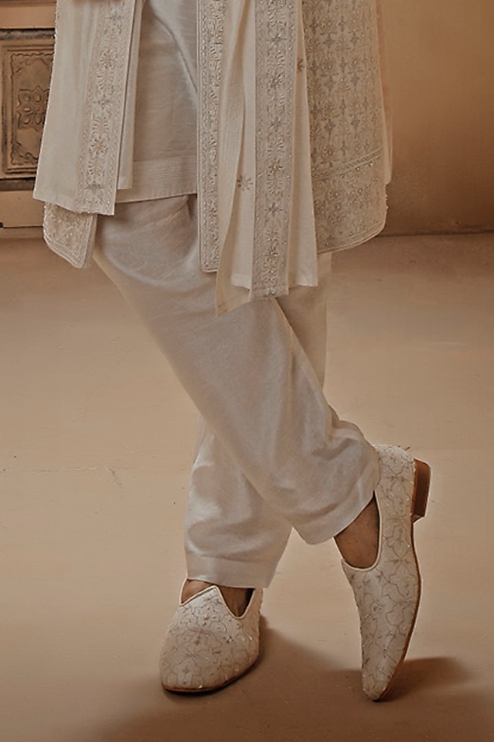 Pearl White Raw Silk Resham Embroidered Groom Sherwani Set by Vanshik at Pernia's Pop Up Shop