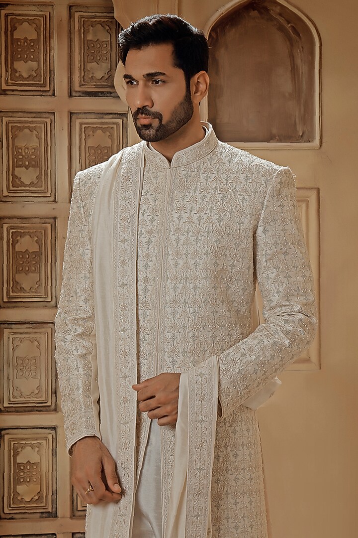 Pearl White Raw Silk Resham Embroidered Groom Sherwani Set by Vanshik at Pernia's Pop Up Shop
