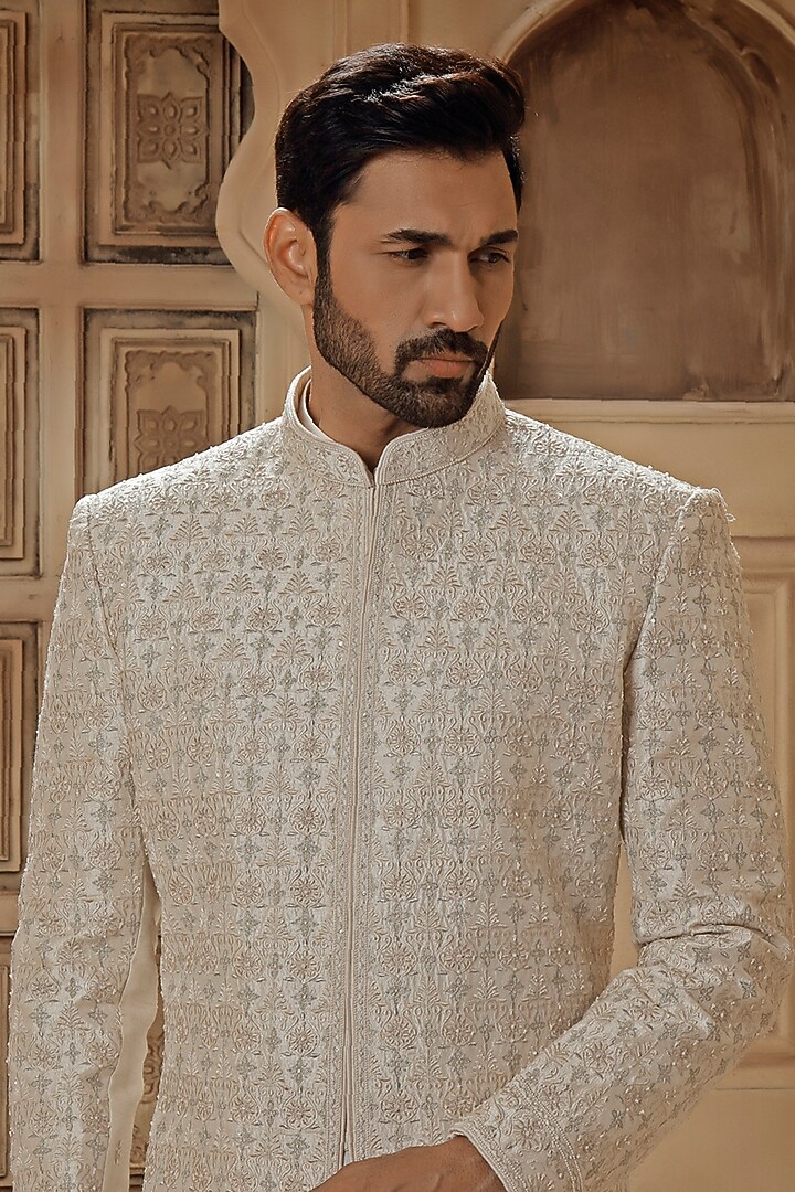 Pearl White Raw Silk Resham Embroidered Groom Sherwani Set by Vanshik at Pernia's Pop Up Shop