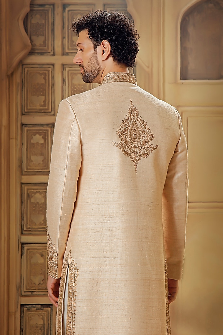 Beige Raw Silk Tilla Embroidered Groom Sherwani Set by Vanshik at Pernia's Pop Up Shop