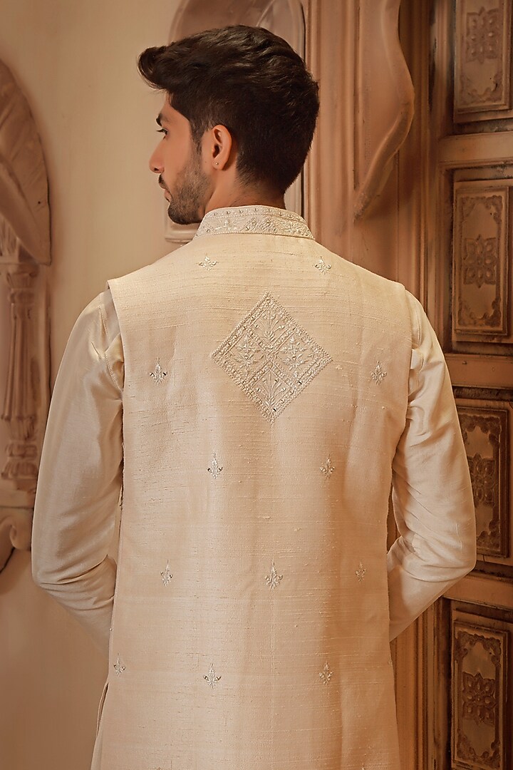 Pearl White Raw Silk Mirror Embroidered Long Bundi Jacket Set by Vanshik at Pernia's Pop Up Shop