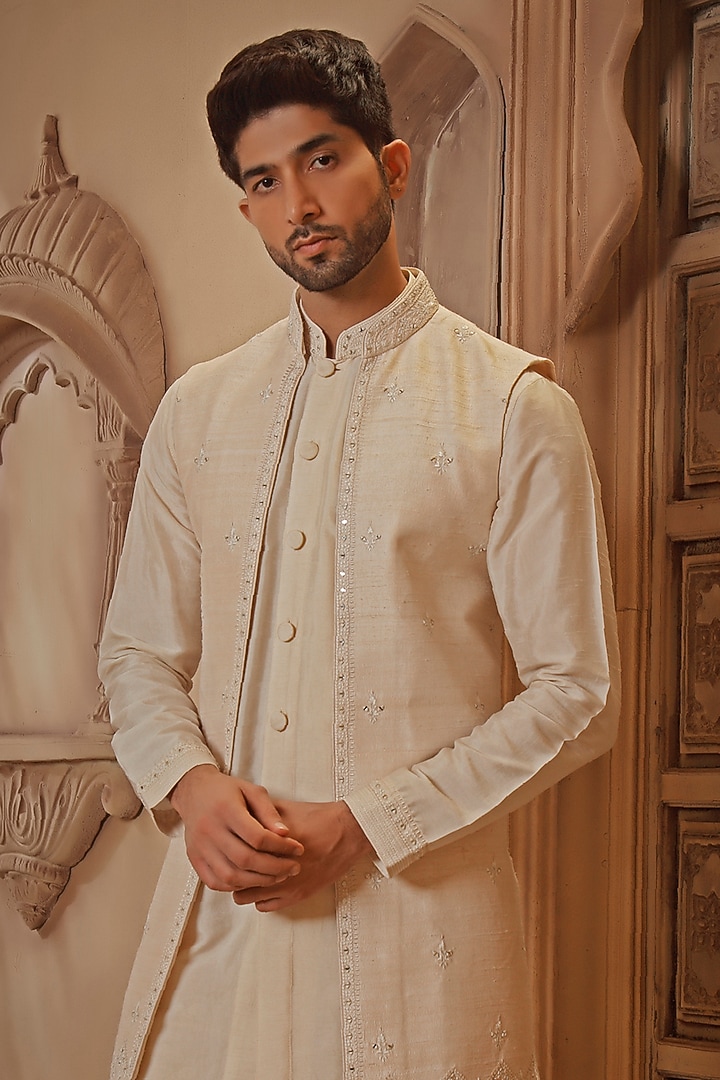 Pearl White Raw Silk Mirror Embroidered Long Bundi Jacket Set by Vanshik at Pernia's Pop Up Shop