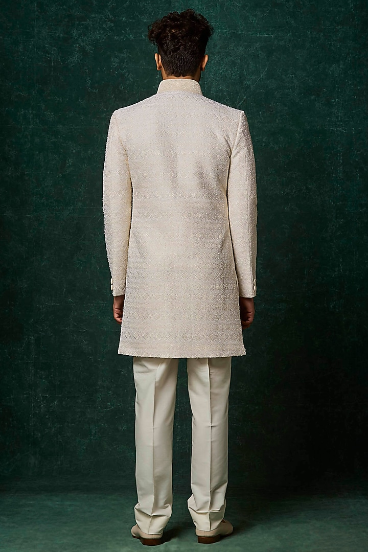 Ivory Silk Pearl Embellished Groom Sherwani Set by Vanshik at Pernia's Pop Up Shop
