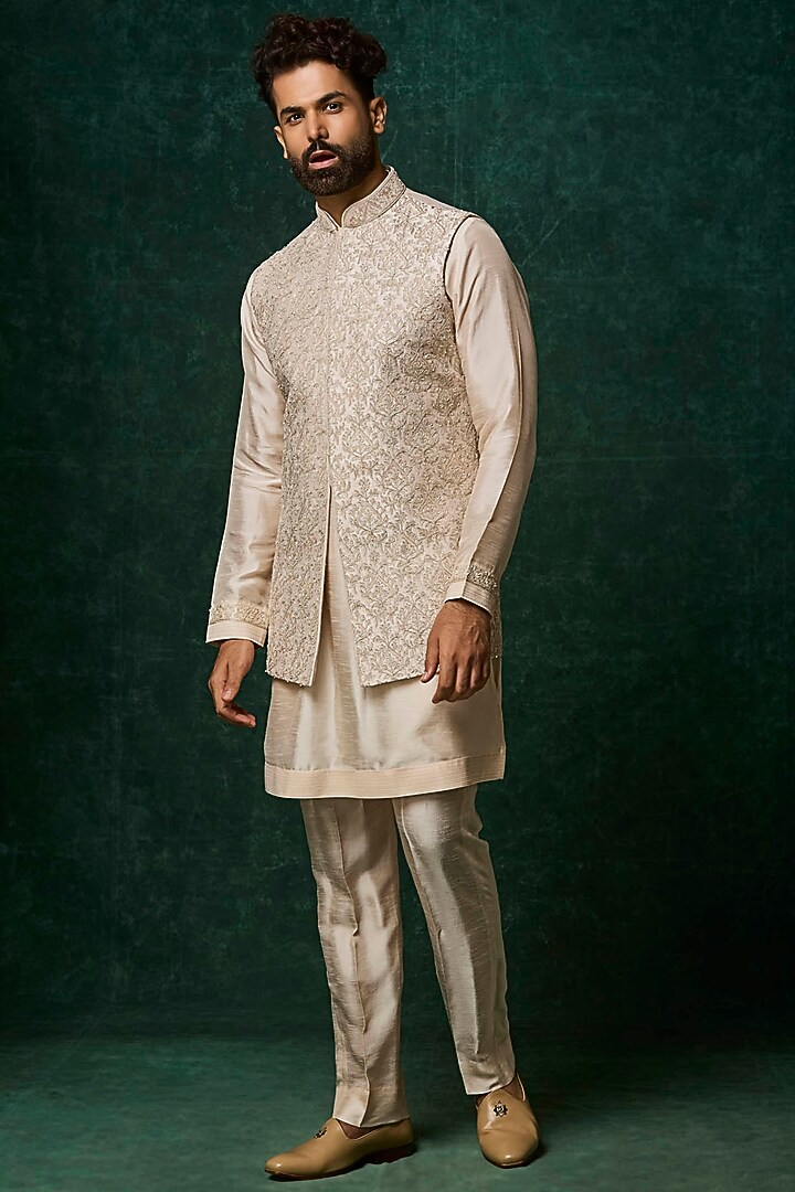 Blush Raw Silk Embroidered Bundi Jacket Set by Vanshik at Pernia's Pop Up Shop