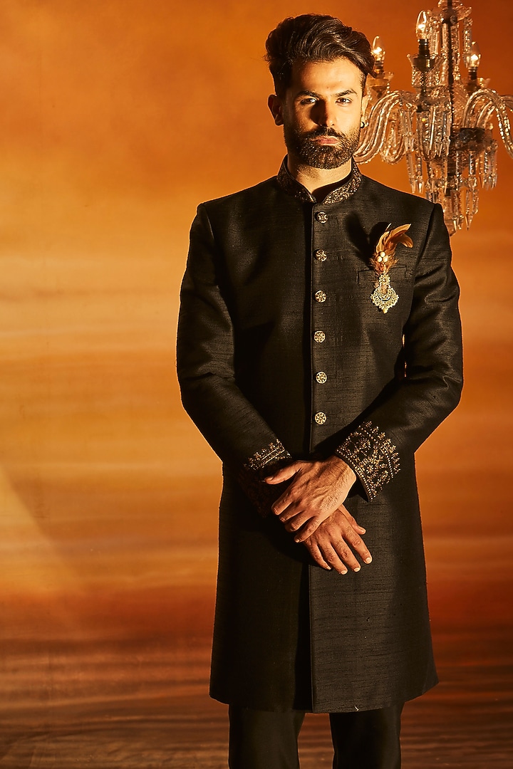 Black Raw Silk Tilla Embroidered Groom Sherwani Set by Vanshik at Pernia's Pop Up Shop