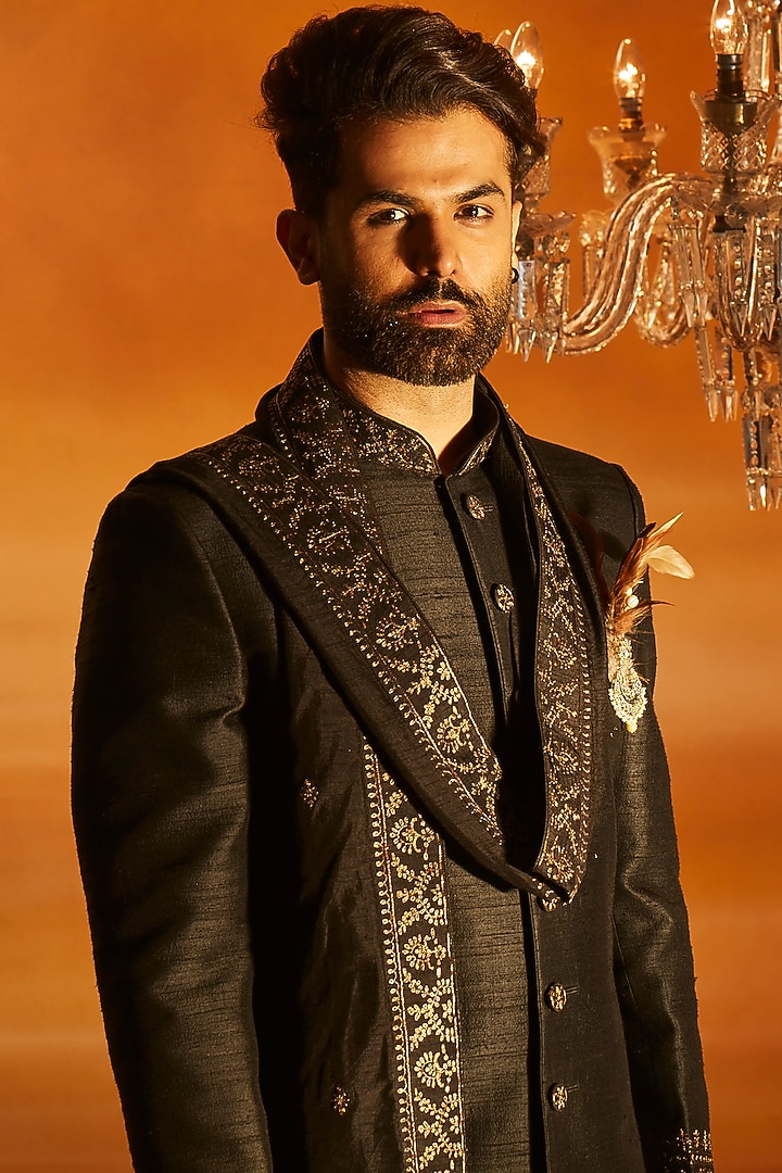 Black Raw Silk Tilla Embroidered Groom Sherwani Set by Vanshik at Pernia's Pop Up Shop
