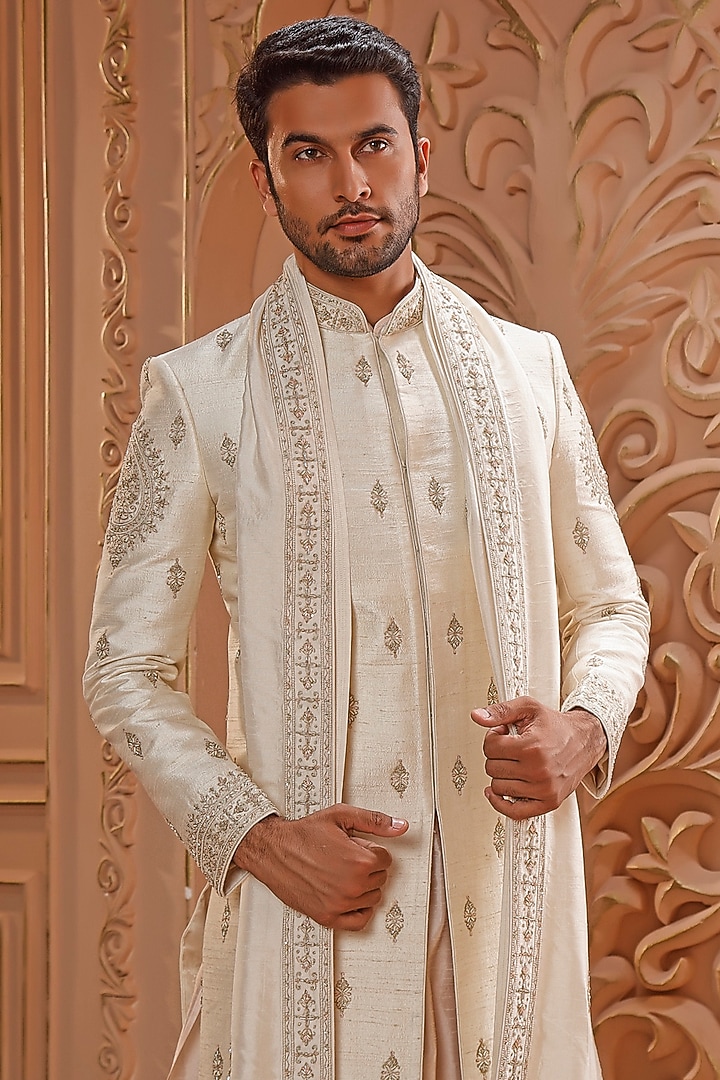 Ivory Raw Silk Zardosi Embroidered Groom Sherwani Set by Vanshik at Pernia's Pop Up Shop
