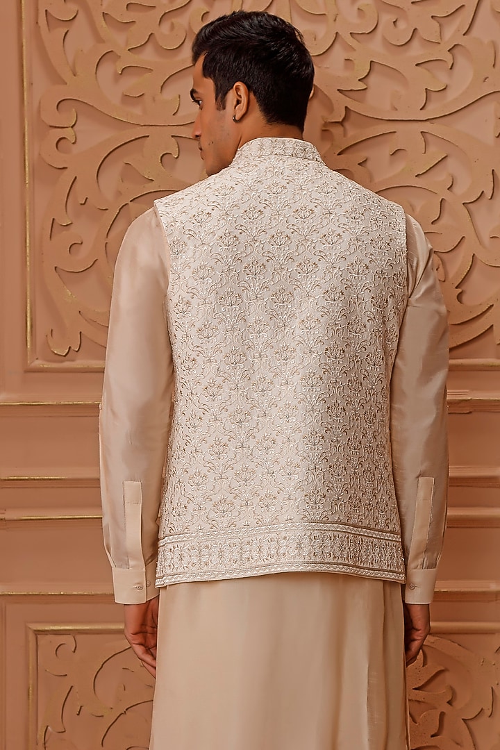 Cream Raw Silk Embroidered Bundi Jacket Set by Vanshik at Pernia's Pop Up Shop
