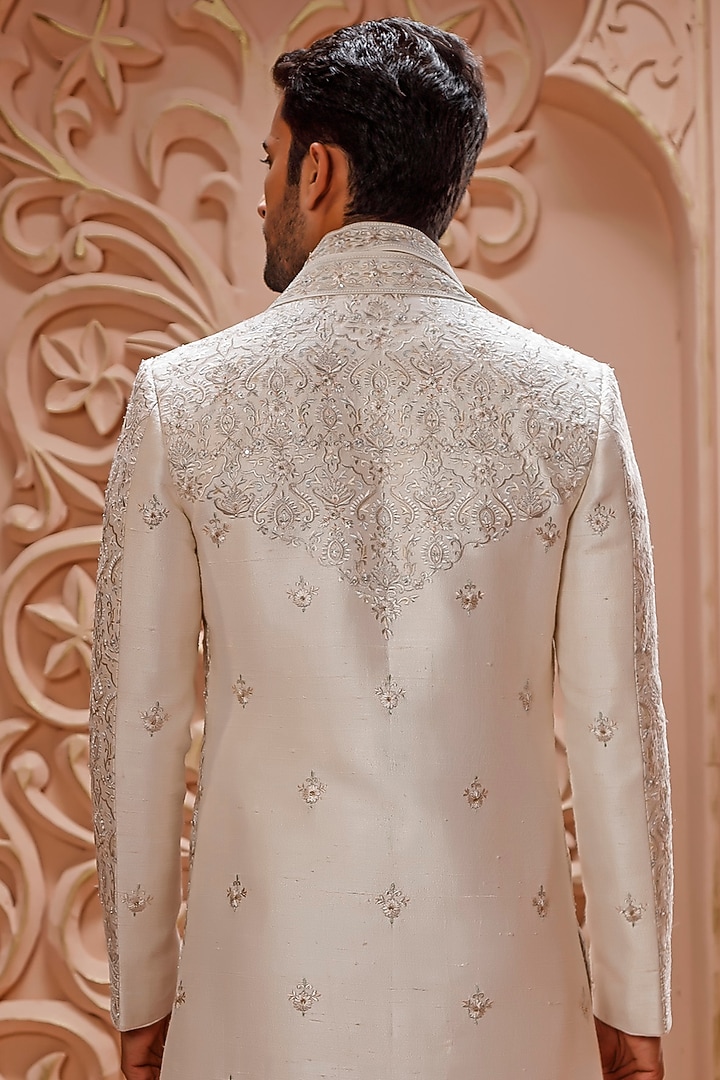 Cream Raw Silk Aari Hand Embroidered Groom Sherwani Set by Vanshik at Pernia's Pop Up Shop