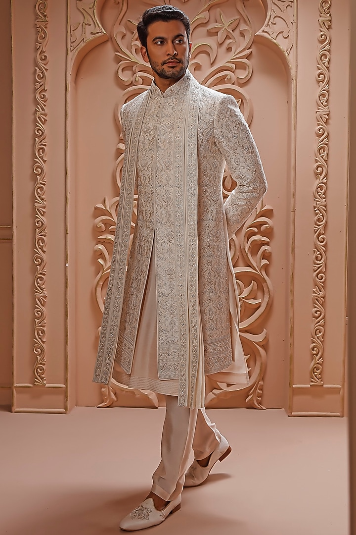 Cream Raw Silk Aari Hand Embroidered Groom Sherwani Set by Vanshik at Pernia's Pop Up Shop