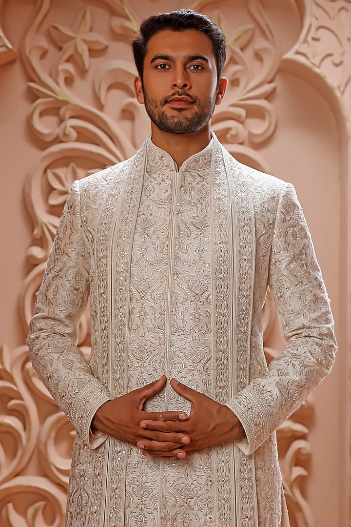 Cream Raw Silk Aari Hand Embroidered Groom Sherwani Set by Vanshik at Pernia's Pop Up Shop
