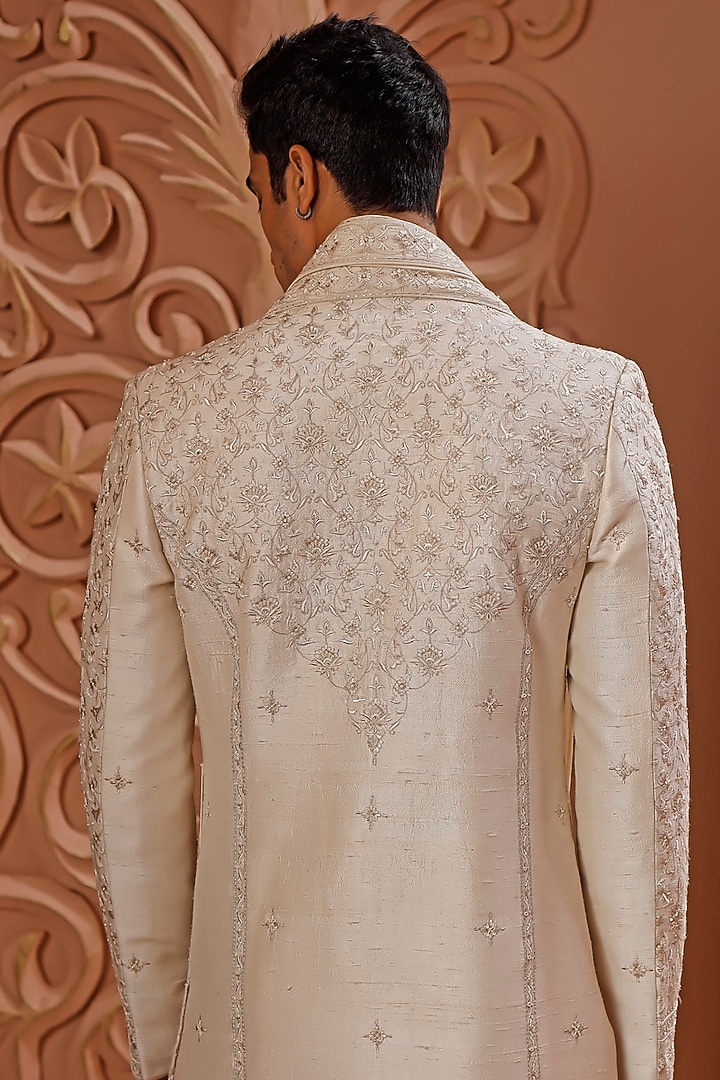 Cream Raw Silk Aari Embroidered Groom Sherwani Set by Vanshik at Pernia's Pop Up Shop