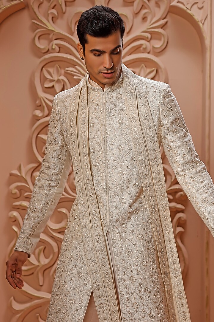 Cream Raw Silk Aari Embroidered Groom Sherwani Set by Vanshik at Pernia's Pop Up Shop