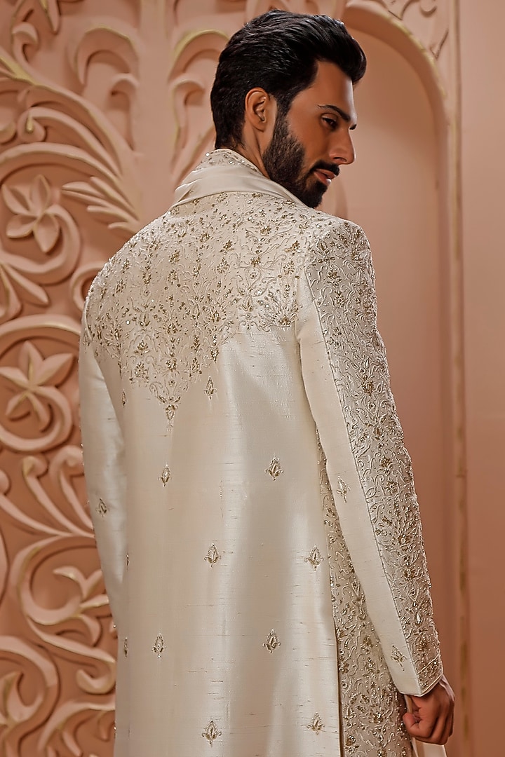 Cream Raw Silk Aari Hand Embroidered Groom Sherwani Set by Vanshik at Pernia's Pop Up Shop