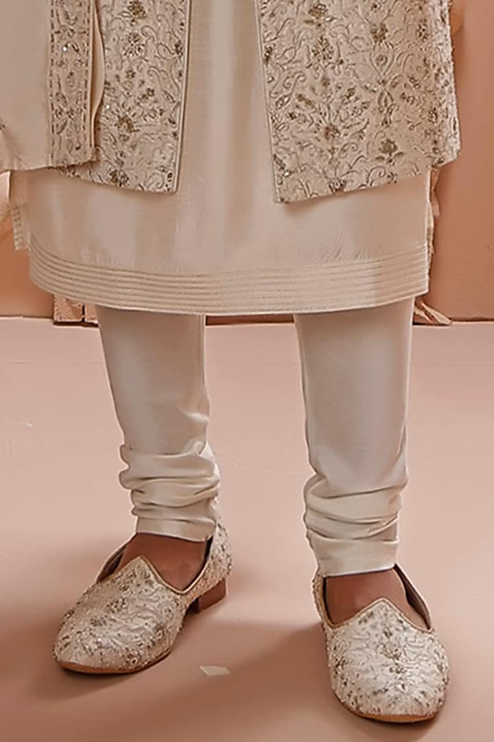 Cream Raw Silk Aari Hand Embroidered Groom Sherwani Set by Vanshik at Pernia's Pop Up Shop