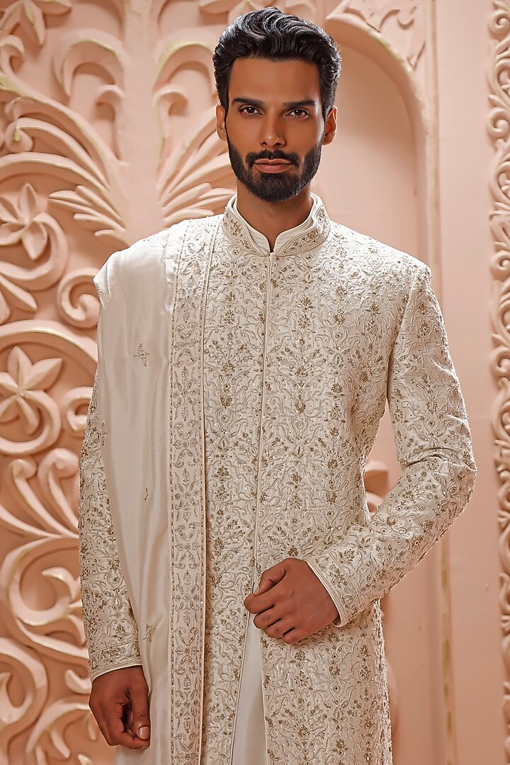 Cream Raw Silk Aari Hand Embroidered Groom Sherwani Set by Vanshik at Pernia's Pop Up Shop