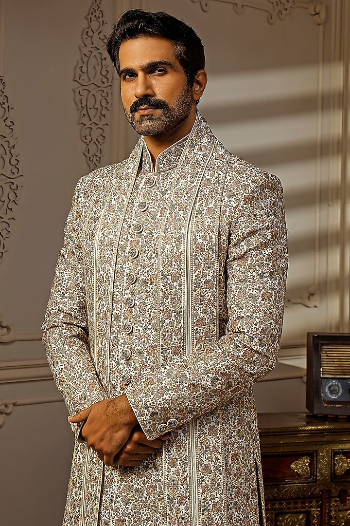 Ivory Tussar Silk Floral Embroidered Groom Sherwani Set by Vanshik at Pernia's Pop Up Shop