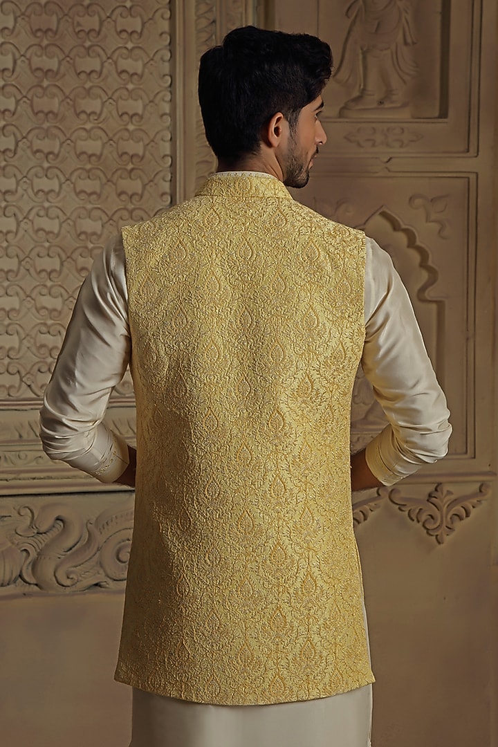 Yellow Raw Silk Dori Jaal Work & Pearl Embroidered Bundi Jacket Set by Vanshik at Pernia's Pop Up Shop