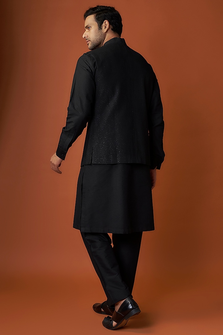 Black Soft Silk Pintuck Bundi Jacket Set by Vanshik at Pernia's Pop Up Shop