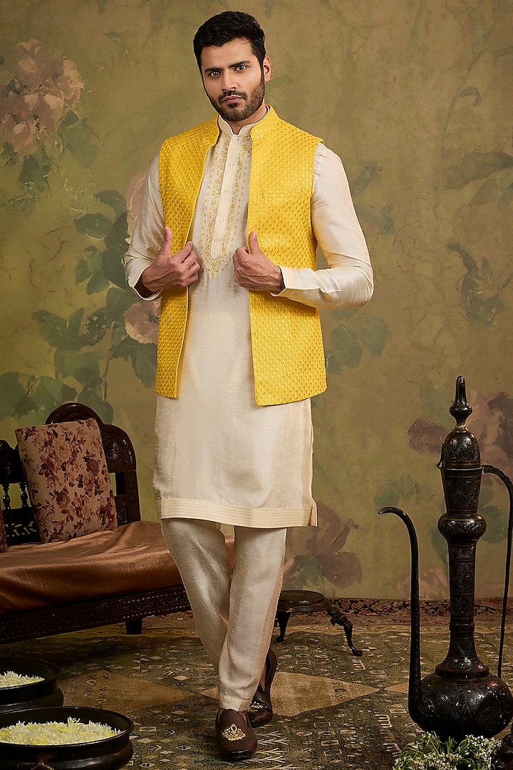 Yellow Silk Embroidered Bundi Jacket Set by Vanshik at Pernia's Pop Up Shop