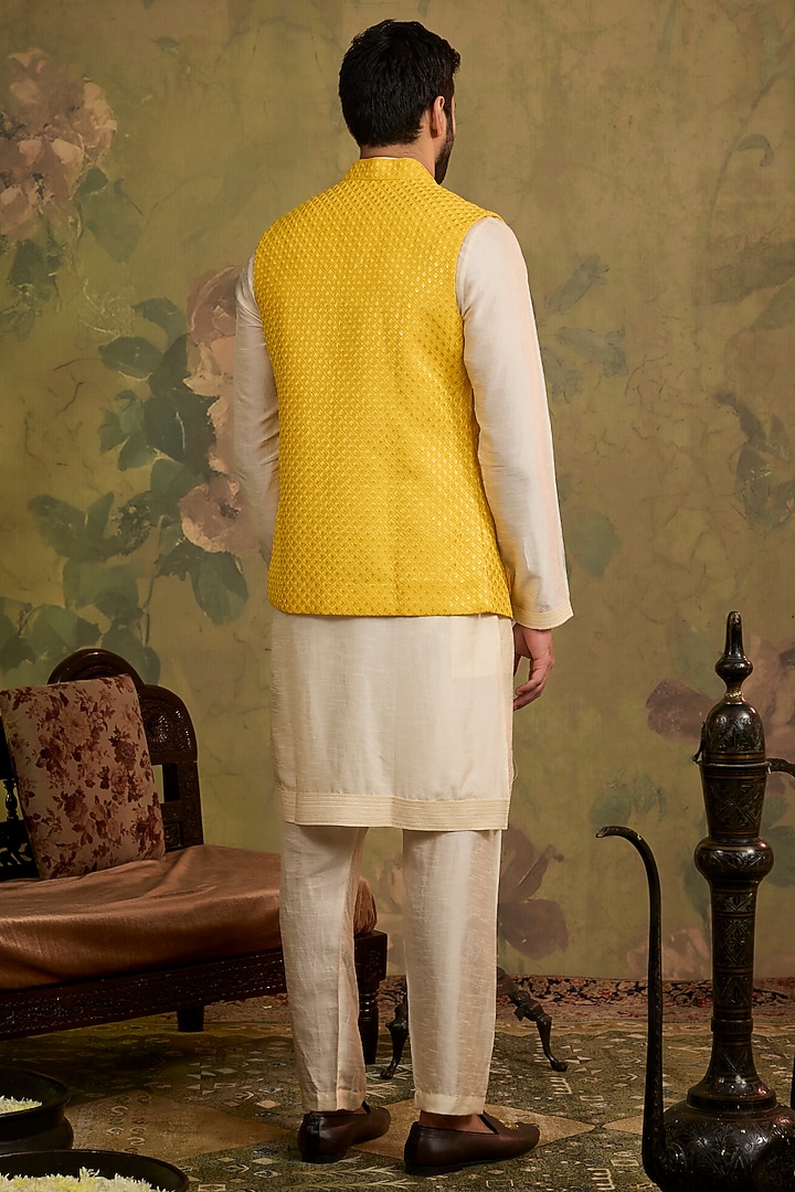 Yellow Silk Embroidered Bundi Jacket Set by Vanshik at Pernia's Pop Up Shop