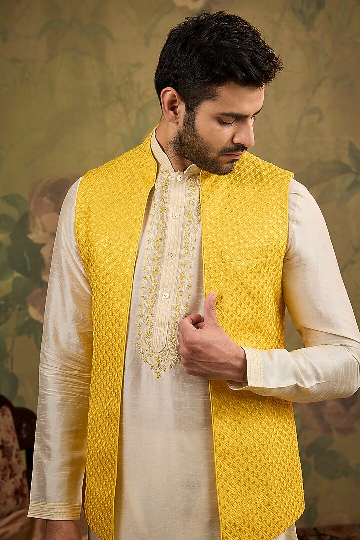 Yellow Silk Embroidered Bundi Jacket Set by Vanshik at Pernia's Pop Up Shop