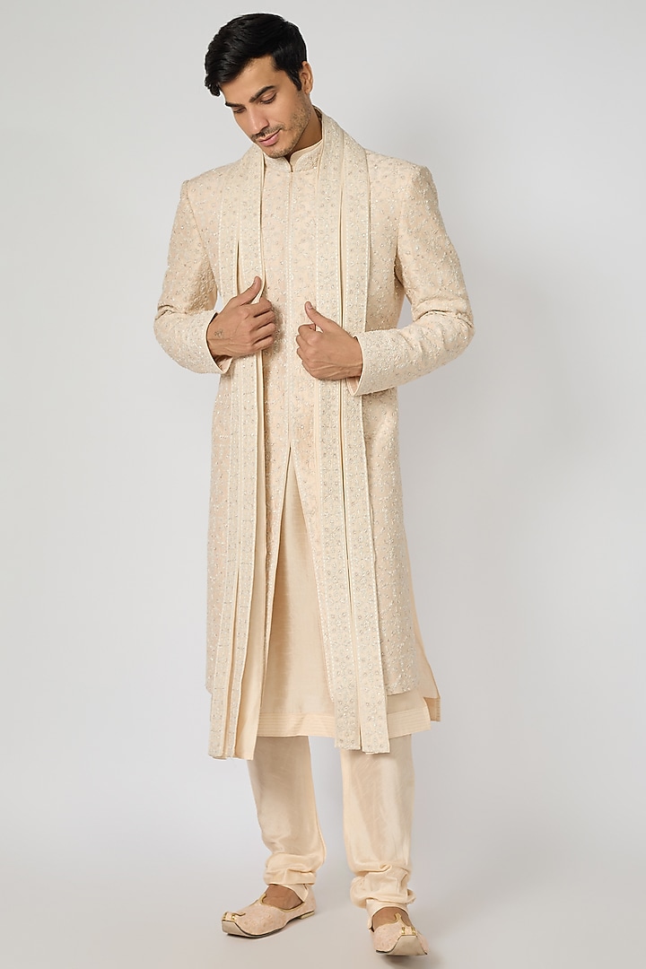 Blush Pink Raw Silk Resham Embroidered Groom Sherwani Set by Vanshik at Pernia's Pop Up Shop