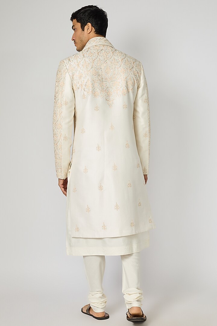 Cream Raw Silk Aari Hand Embroidered Groom Sherwani Set by Vanshik at Pernia's Pop Up Shop
