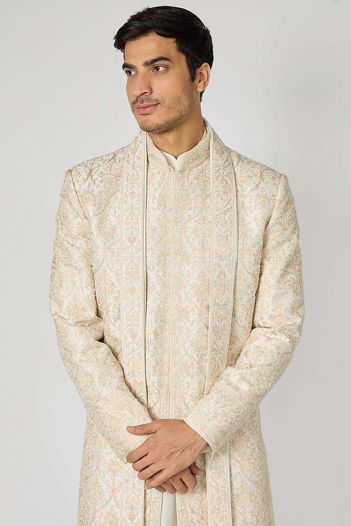 Cream Raw Silk Aari Hand Embroidered Groom Sherwani Set by Vanshik at Pernia's Pop Up Shop