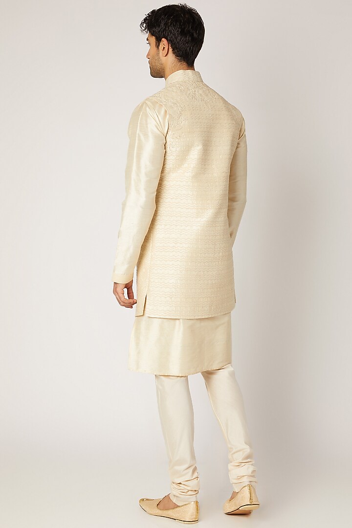 Cream Raw Silk Embroidered Bundi Jacket Set by Vanshik at Pernia's Pop Up Shop