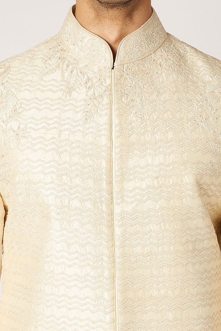 Cream Raw Silk Embroidered Bundi Jacket Set by Vanshik at Pernia's Pop Up Shop