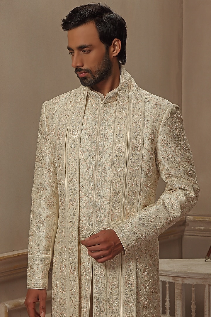 Cream Raw Silk Aari Hand Embroidered Groom Sherwani Set by Vanshik at Pernia's Pop Up Shop