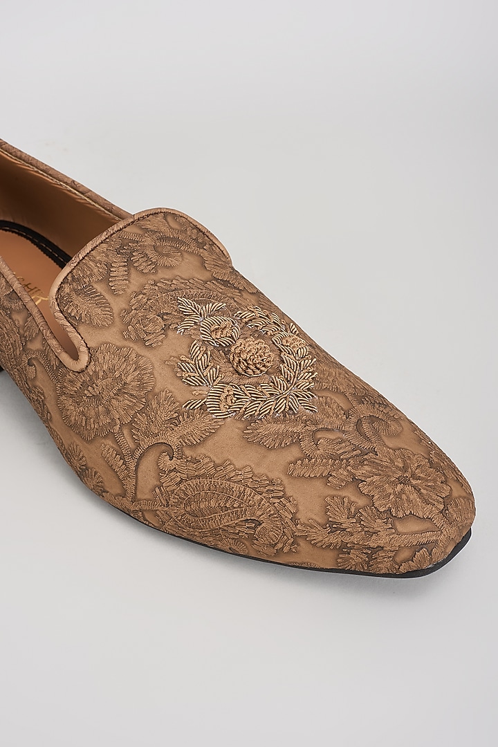 Tan Suede Motif Embroidered Mojaris by Vanshik at Pernia's Pop Up Shop