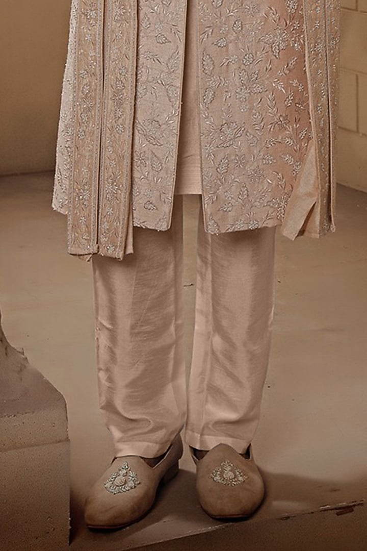 Dull Rose Pink Raw Silk Cutdana Embroidered Groom Sherwani Set by Vanshik at Pernia's Pop Up Shop