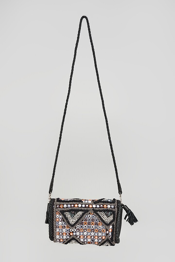 Black Banjara Patch Fabric Tassels & Thread Embroidered Handcrafted Sling Bag by Vipul Shah Bags at Pernia's Pop Up Shop