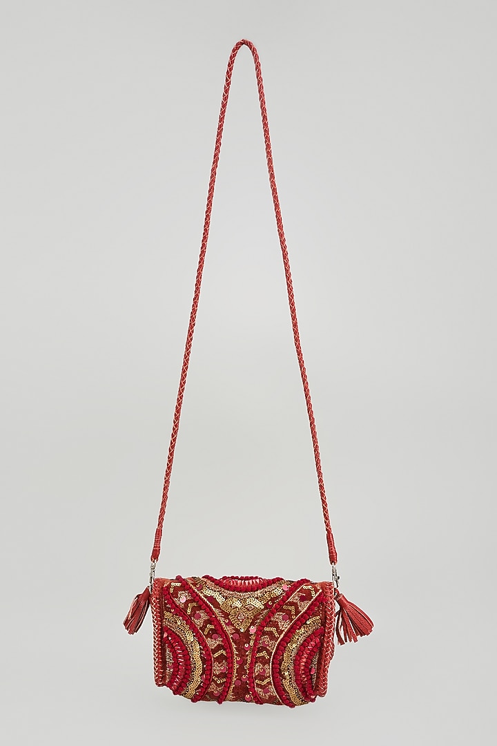 Red Banjara Patch Fabric Tassels & Thread Embroidered Handcrafted Sling Bag by Vipul Shah Bags at Pernia's Pop Up Shop