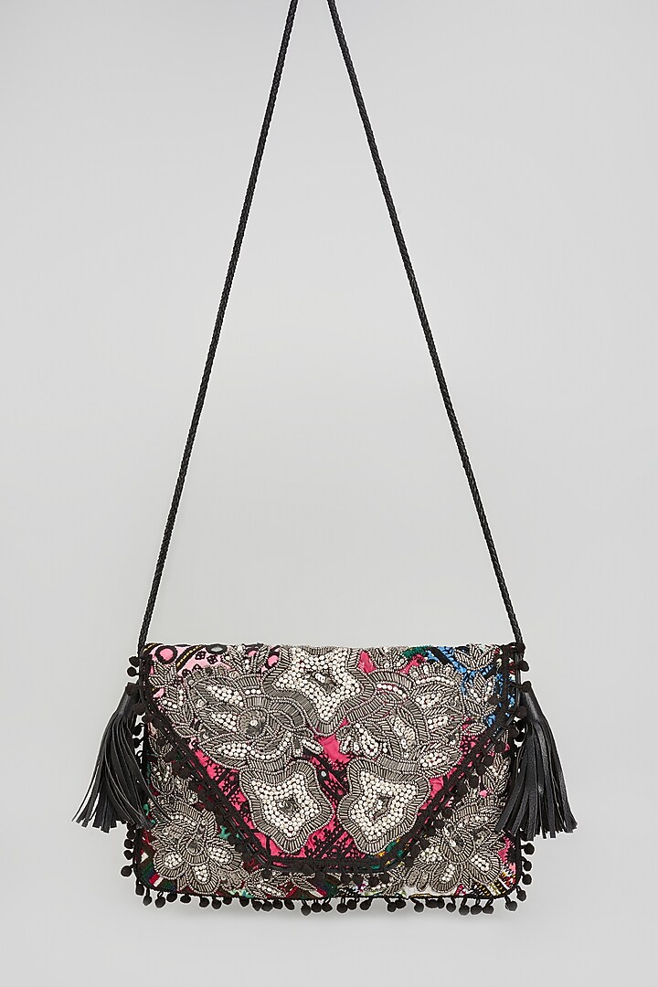 Black Banjara Patch Fabric Tassels & Thread Embroidered Handcrafted Sling Bag by Vipul Shah Bags at Pernia's Pop Up Shop