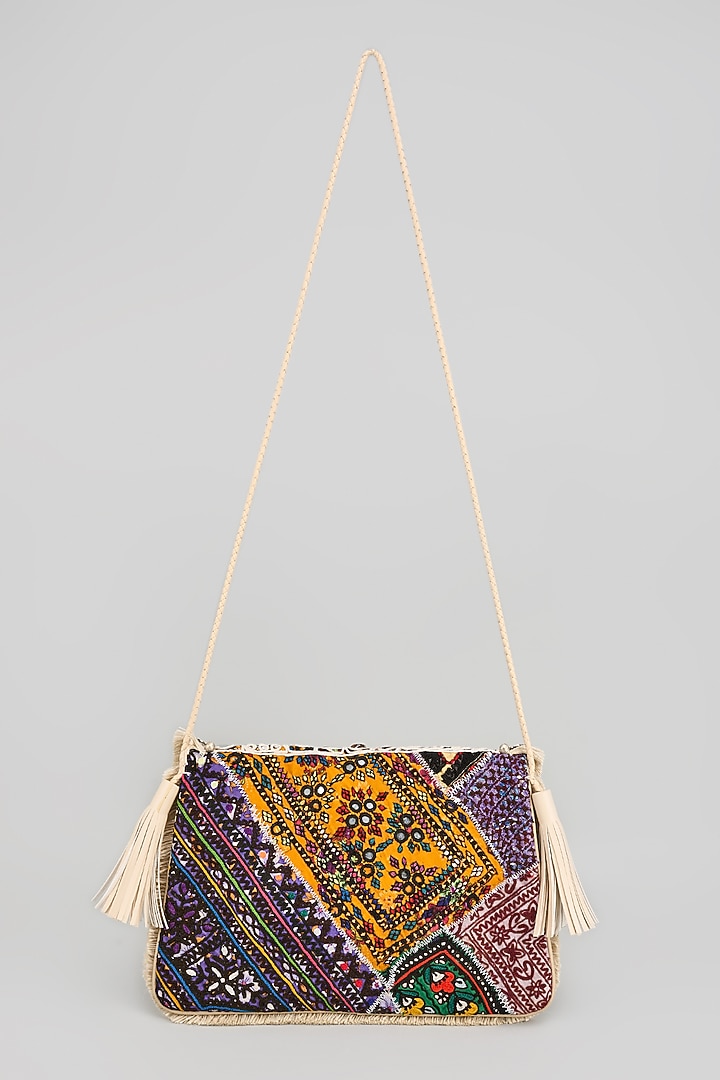 White Banjara Patch Fabric Embroidered Handbag by Vipul Shah Bags at Pernia's Pop Up Shop