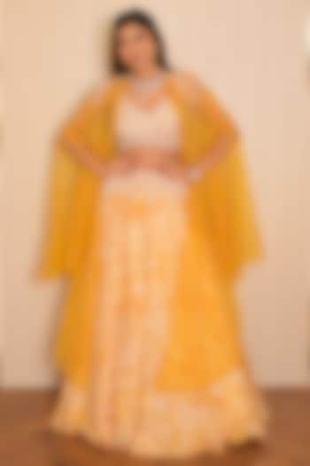 Yellow Silk Crepe Printed Jacket Wedding Lehenga Set by Vridhi Somaani at Pernia's Pop Up Shop