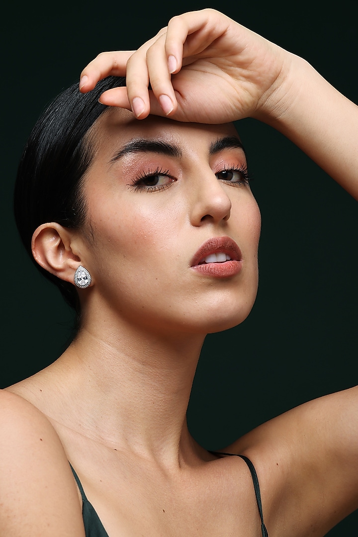 White Finish Zircon Handcrafted Stud Earrings In Sterling Silver by Varnika Arora at Pernia's Pop Up Shop