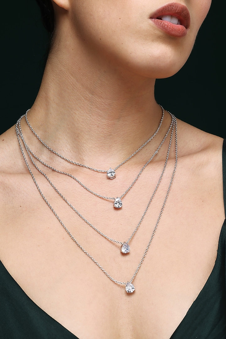 White Finish Pear-Shaped Zircon Handcrafted Layered Necklace by Varnika Arora at Pernia's Pop Up Shop