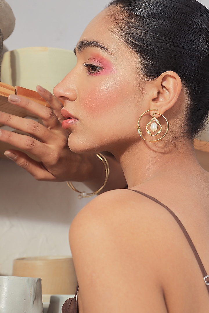 Gold Plated Earrings With Pearls by Varnika Arora