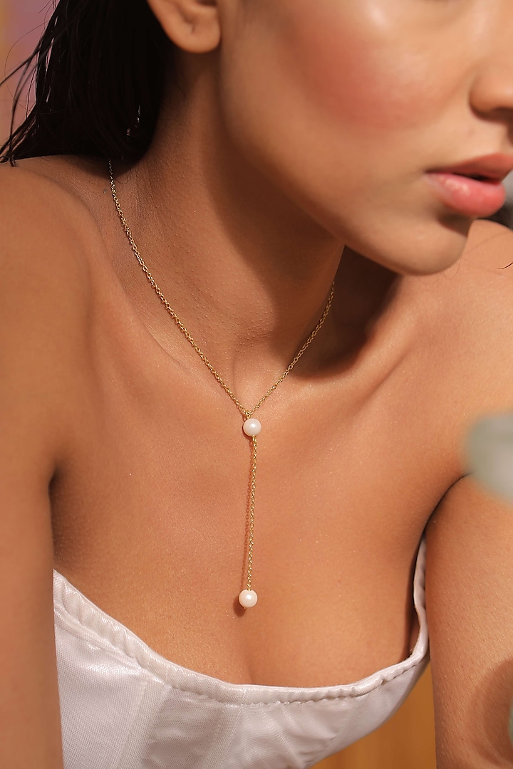 Gold Plated Pearl Necklace In Alloy by Varnika Arora